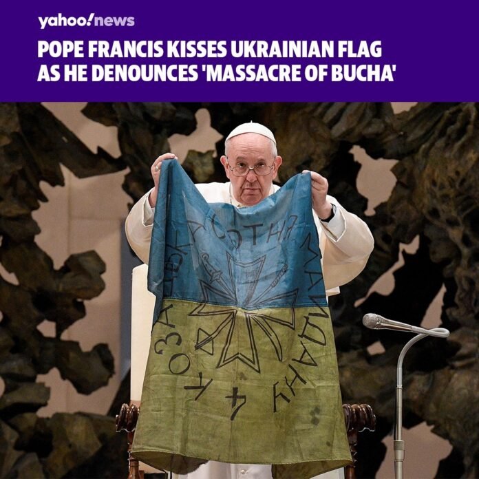 Pope Francis on Wednesday condemned the “massacre of Bucha” and kissed a worn-ou