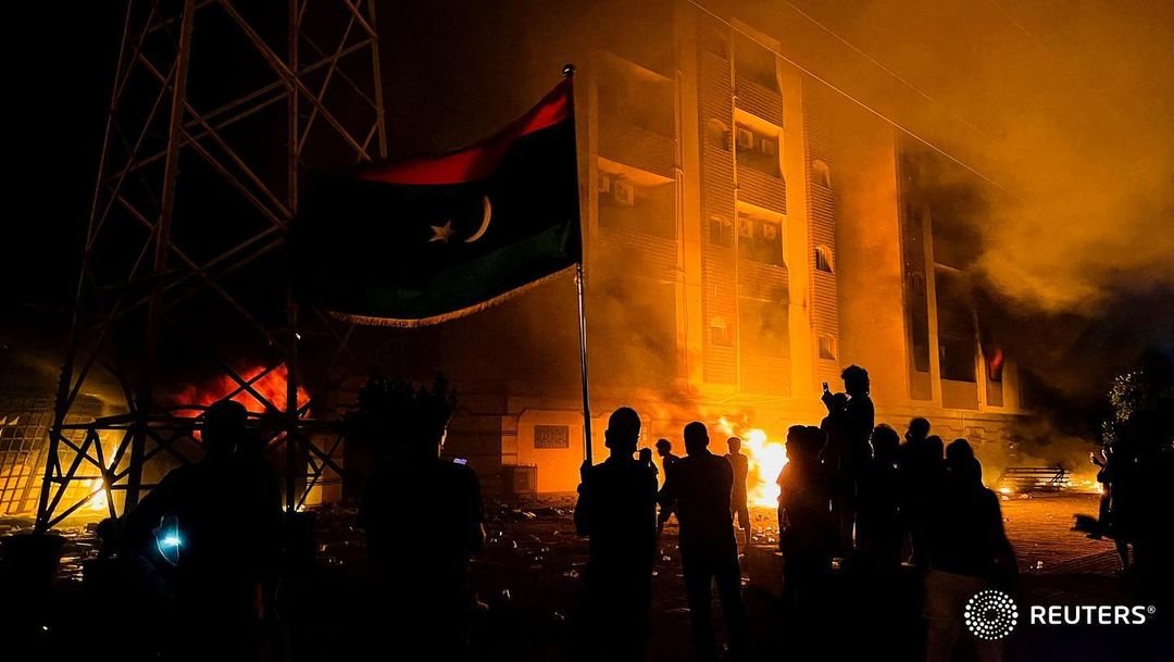 Protesters set fire to the Libyan parliament building after protests against the